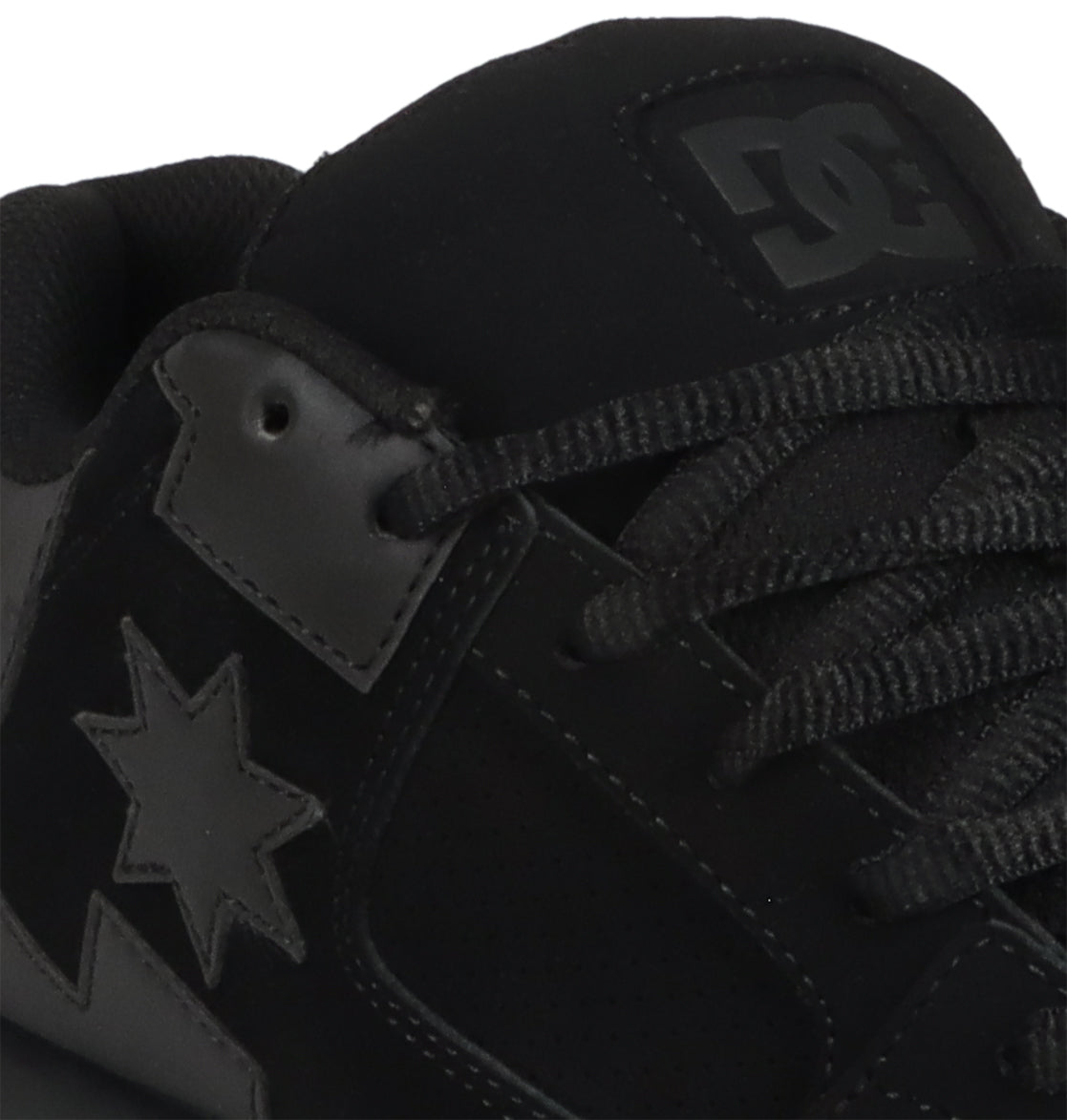 Close-up of the DC Shoes Men’s Command skate shoe in black, featuring black laces, a star logo on the side, and the DC logo on the tongue. This style delivers signature cushioning and classic DC bulk for enduring comfort and support.
