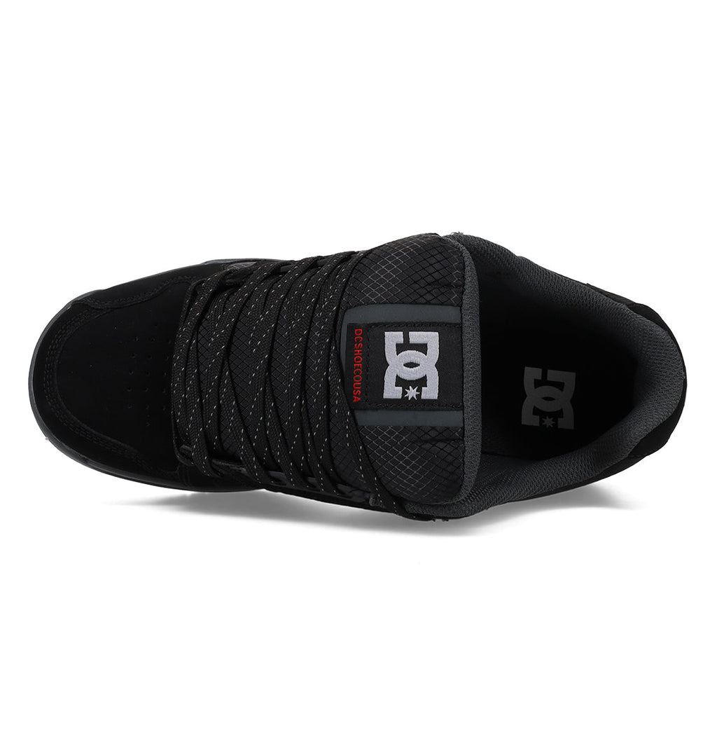 Top view of the Men’s Stag Winterized Shoes by DC Shoes, featuring black-and-white speckled laces, a mesh-textured tongue with a DC Shoes logo label at the top. The interior is black with padded sides for comfort and includes lightweight cushioning for enhanced impact absorption.