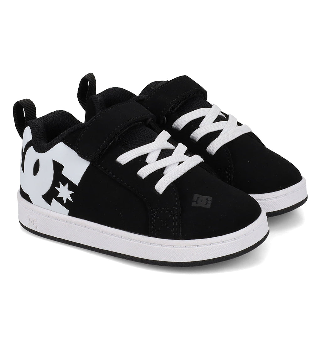 A pair of DC Shoes Kids’ Court Graffik Shoes - Toddler in classic black, showcasing the iconic puffy silhouette with crisp white laces, contrasting white soles, and a bold white DC logo on the side—perfect for young trendsetters.