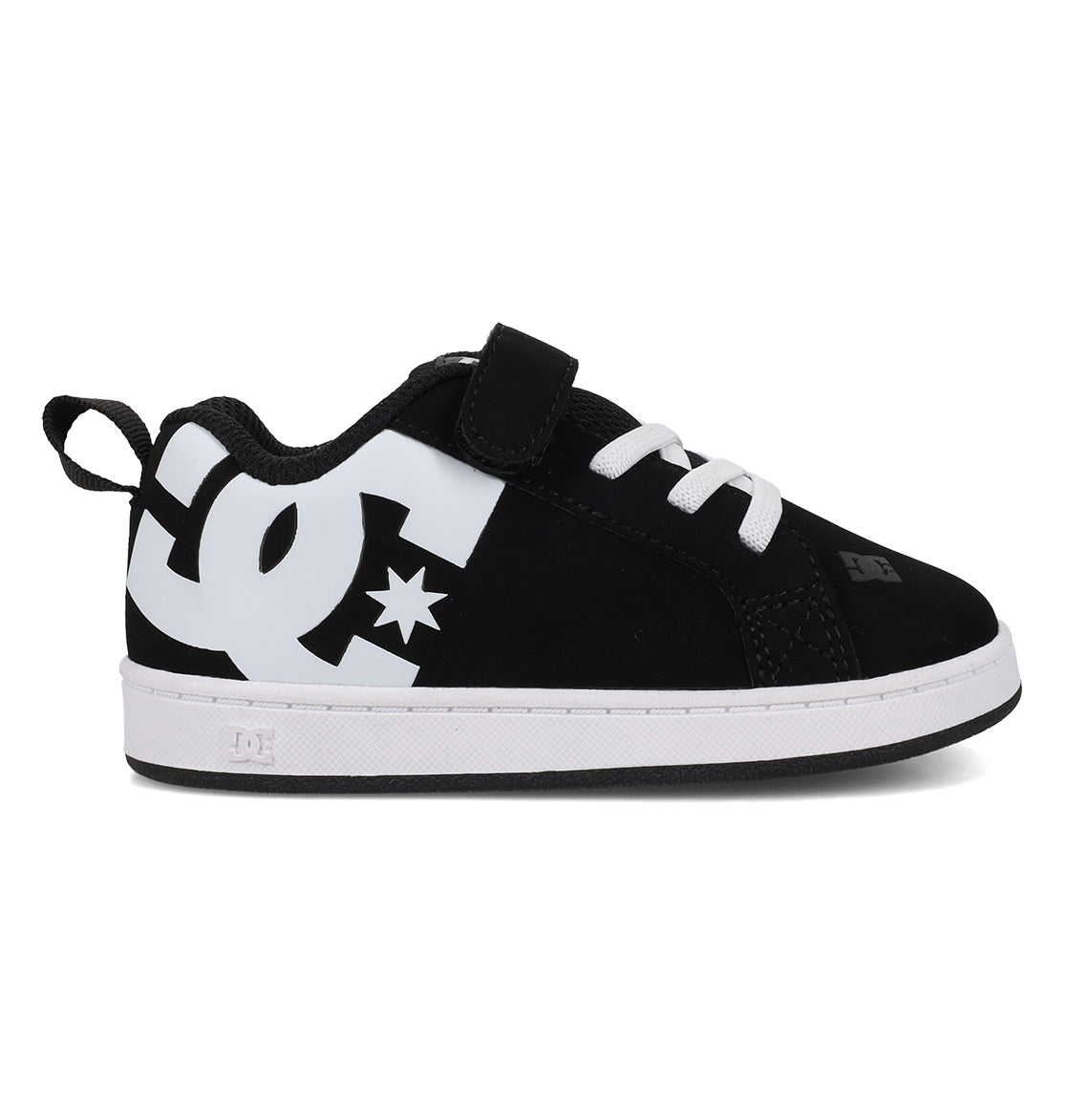 The Kids’ Court Graffik Shoes - Toddler by DC Shoes feature a puffy black upper with a large white DC logo on the side, complemented by white laces, a velcro strap, and a white sole. Inspired by the iconic Court Graffik style, these black and white sneakers are pictured in a side profile view.