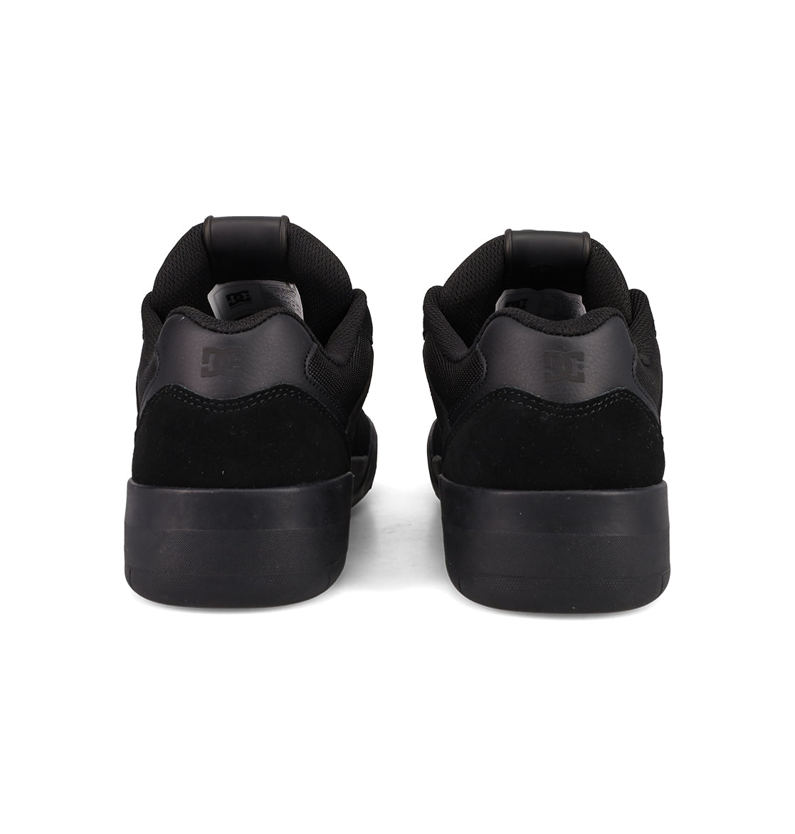 A pair of DC Shoes Men's Fractal Shoes in black shown from the back, highlighting padded collars and subtle heel logos—combining street-inspired style with performance comfort.