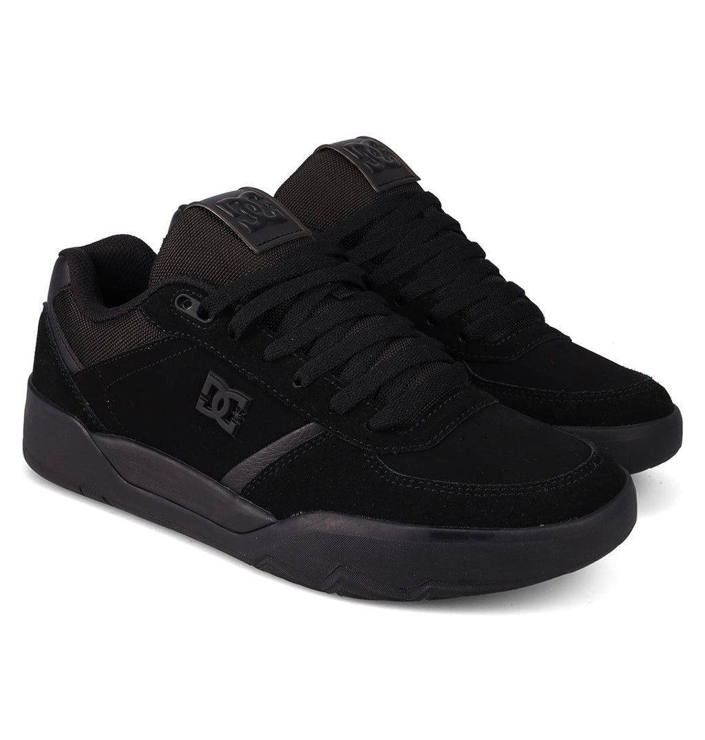 The DC Shoes Men's Fractal Shoes feature thick rubber soles, black laces, and DC branding on the side and tongue for street-ready style and comfort, displayed against a white background.