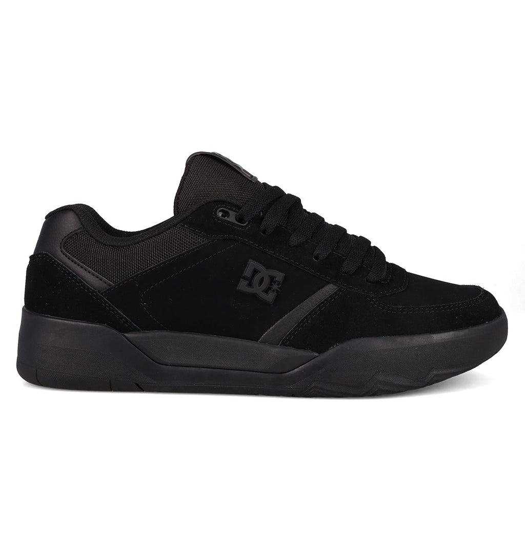 The DC Shoes Men's Fractal features a low-top silhouette in black, with a lace-up front, DC logo on the side, mesh and suede textures, and a thick rubber sole for street style and performance comfort.