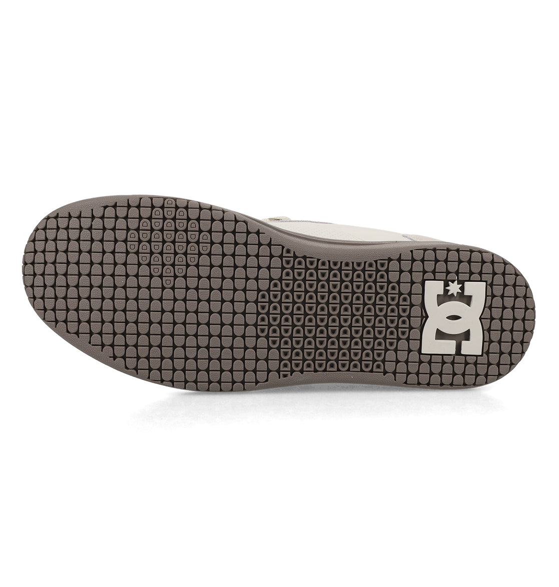 The image displays the sole of the Men’s Astrix Shoes by DC Shoes, featuring a textured, grid-like tread pattern engineered for optimal board control and showcasing a white DC Shoes logo close to the heel.