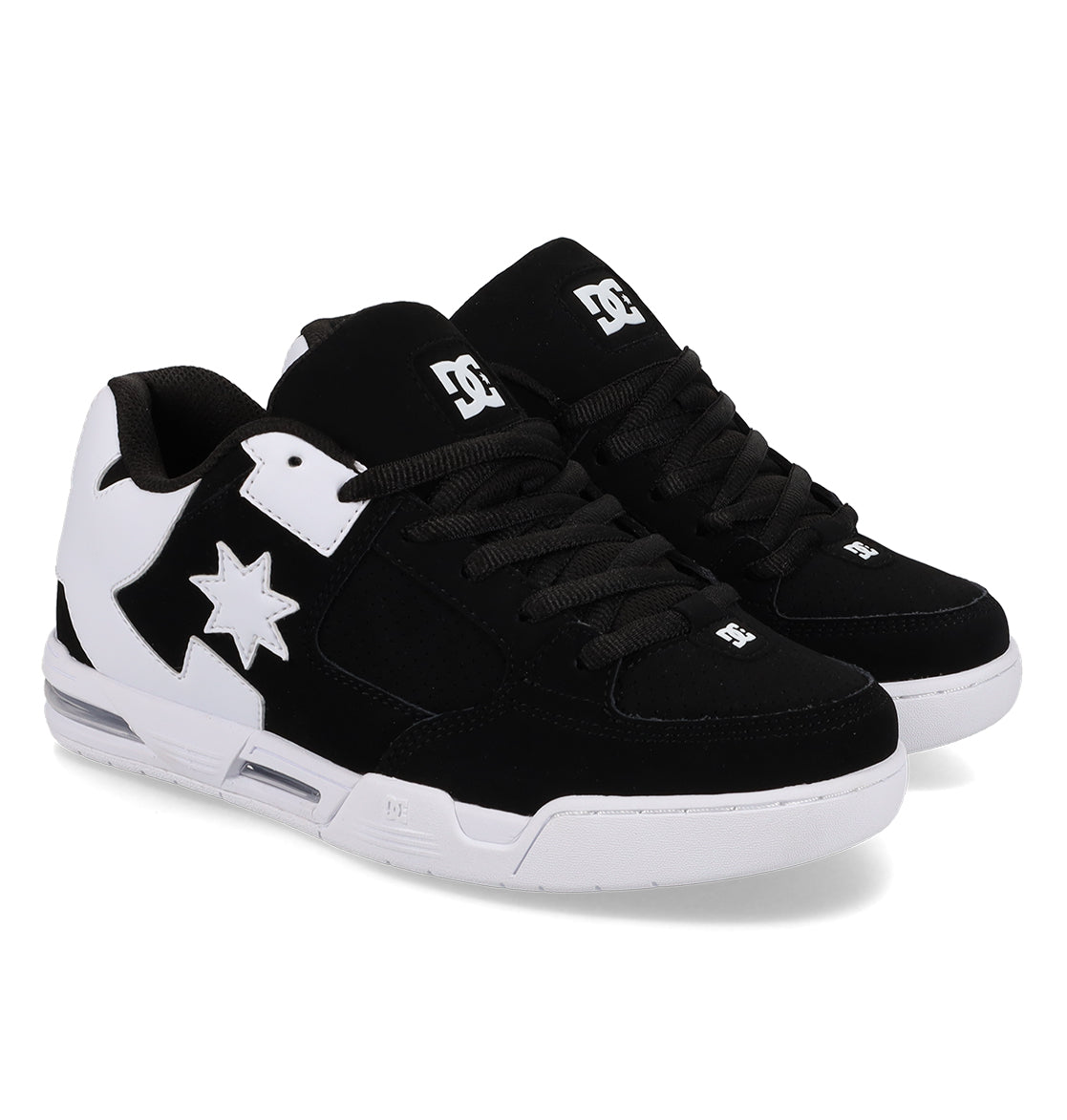A pair of Women’s Command Shoes by DC Shoes in black and white, featuring white soles, black laces, and a white star design on the side. Designed with signature DC cushioning for comfort and support, these sneakers exude classic style as they rest side by side, angled slightly to the right.