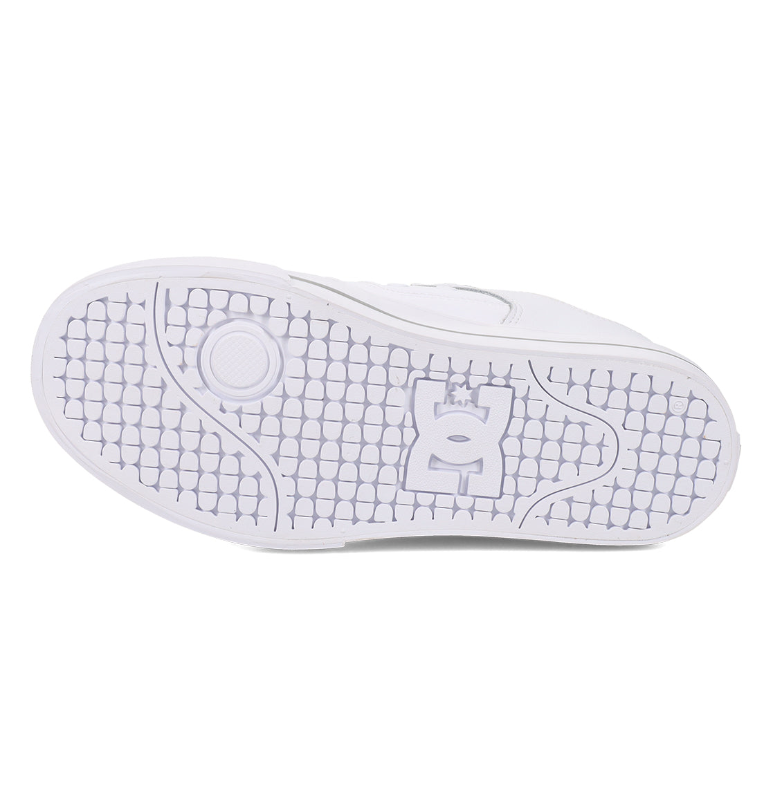 The image displays the white sole of the Women’s Pure Shoes by DC Shoes, featuring a textured pattern with a circular design near the toe and a stylized DC logo in the center. Designed for lightweight cushioning, this sole delivers comfort and everyday impact absorption.