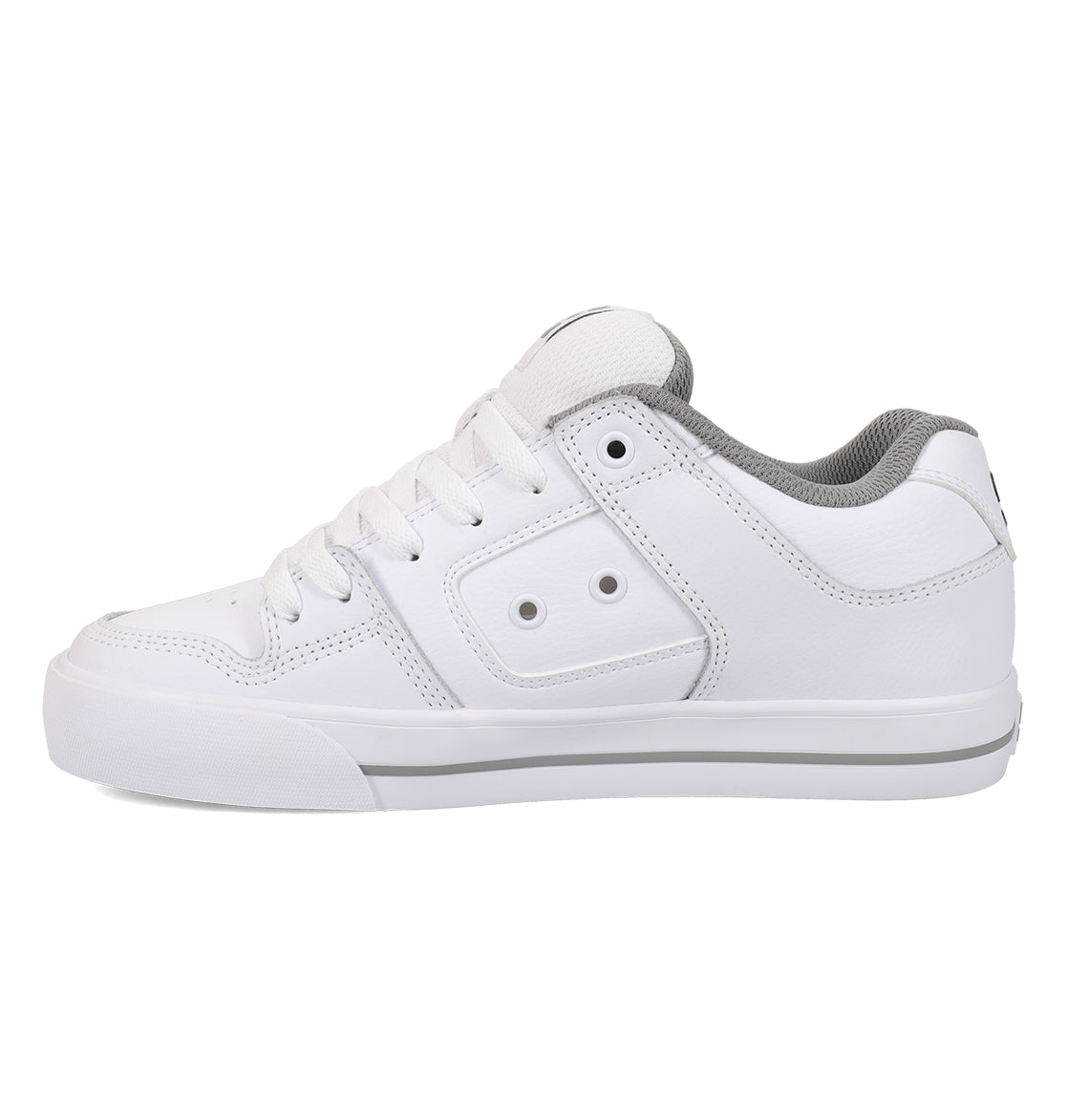 The Women’s Pure Shoes by DC Shoes are white low-top sneakers featuring grey lining, white laces, and a white sole with a thin grey stripe along the side. They are designed with lightweight cushioning for enhanced impact absorption and all-day comfort.