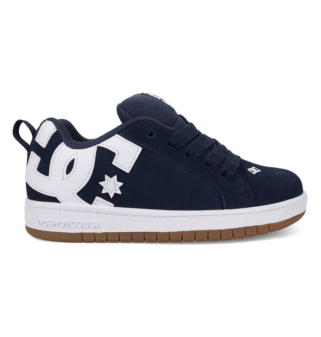 Kids’ Court Graffik Shoes by DC Shoes in navy blue and white, featuring a gum sole, thick laces, a puffy silhouette, and a large white DC logo on the side.