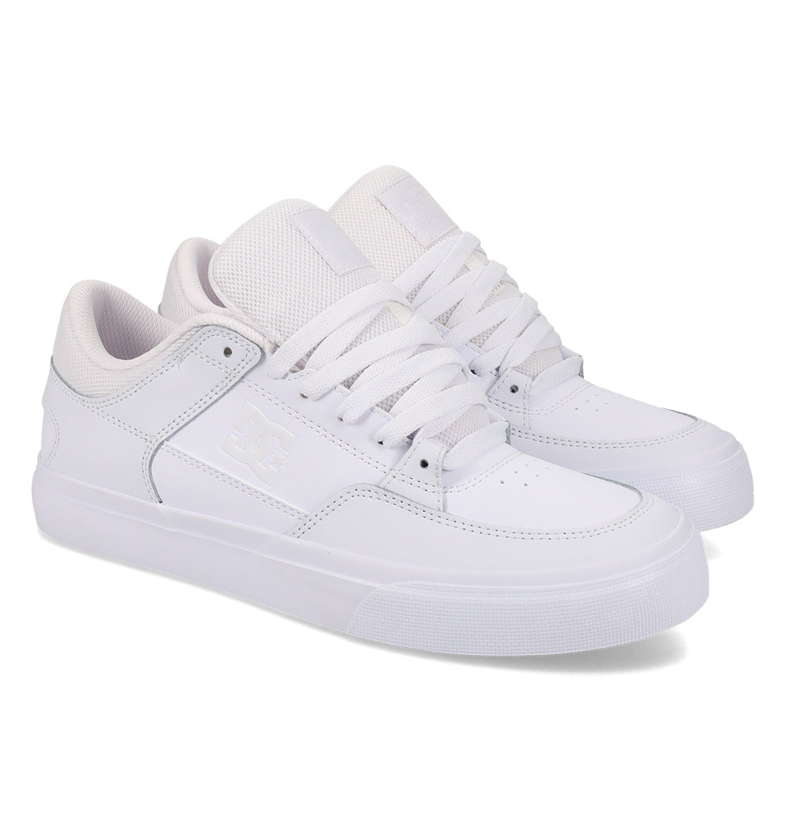 A pair of DC Shoes Men’s Onyx low-top sneakers in white, featuring laces, mesh tongues, and understated branding on the side and tongue—your everyday go-to—displayed side by side against a plain white background.