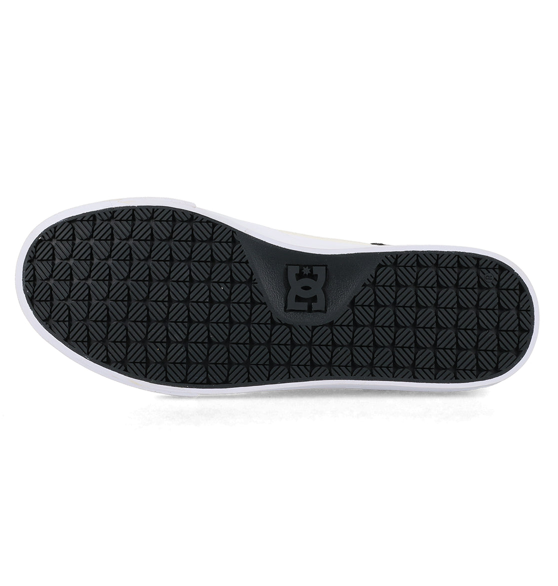 Black rubber sole of the Men’s Onyx Skate Shoes by DC Shoes, featuring a geometric tread pattern and the DC Shoes logo in the center, bordered by a white edge. Photographed against a plain white background, this sole is crafted for the minimalist silhouette of an everyday go-to vulc shoe.