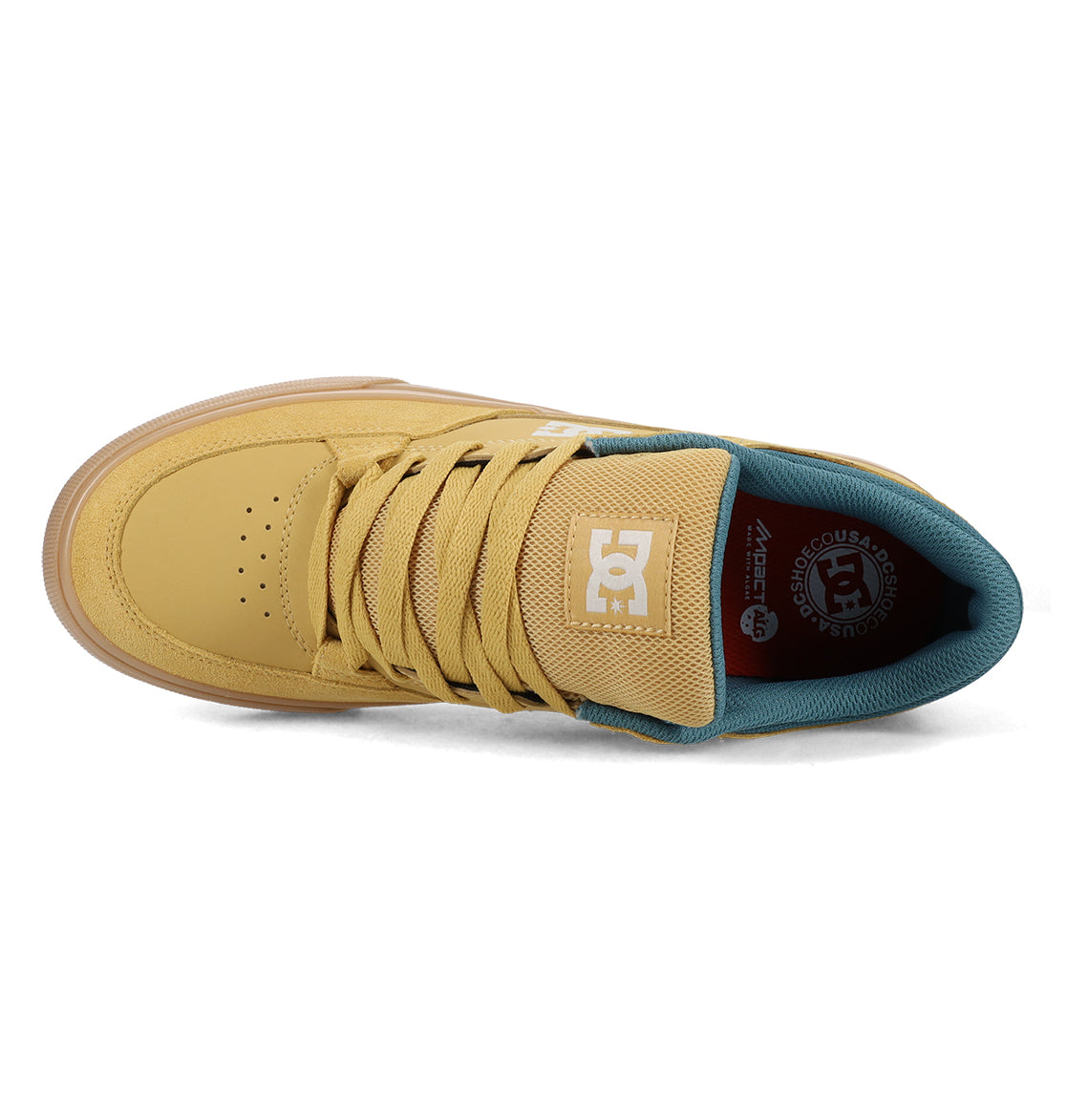 Top view of a yellow Men’s Onyx Skate Shoe by DC Shoes, featuring a teal inner lining, perforated toe box, and a white DC logo on the tongue. This minimal silhouette vulc shoe offers both style and durability for everyday wear.