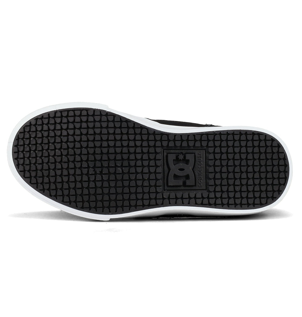 The image shows the black rubber sole of the DC Shoes Kids’ Onyx Shoes, featuring a textured grip pattern and the DC logo in the center—perfect as an everyday go-to vulc shoe with a minimal silhouette.