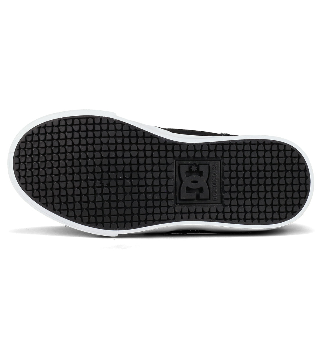The image shows the black rubber sole of the DC Shoes Kids’ Onyx Shoes, featuring a textured grip pattern and the DC logo in the center—perfect as an everyday go-to vulc shoe with a minimal silhouette.
