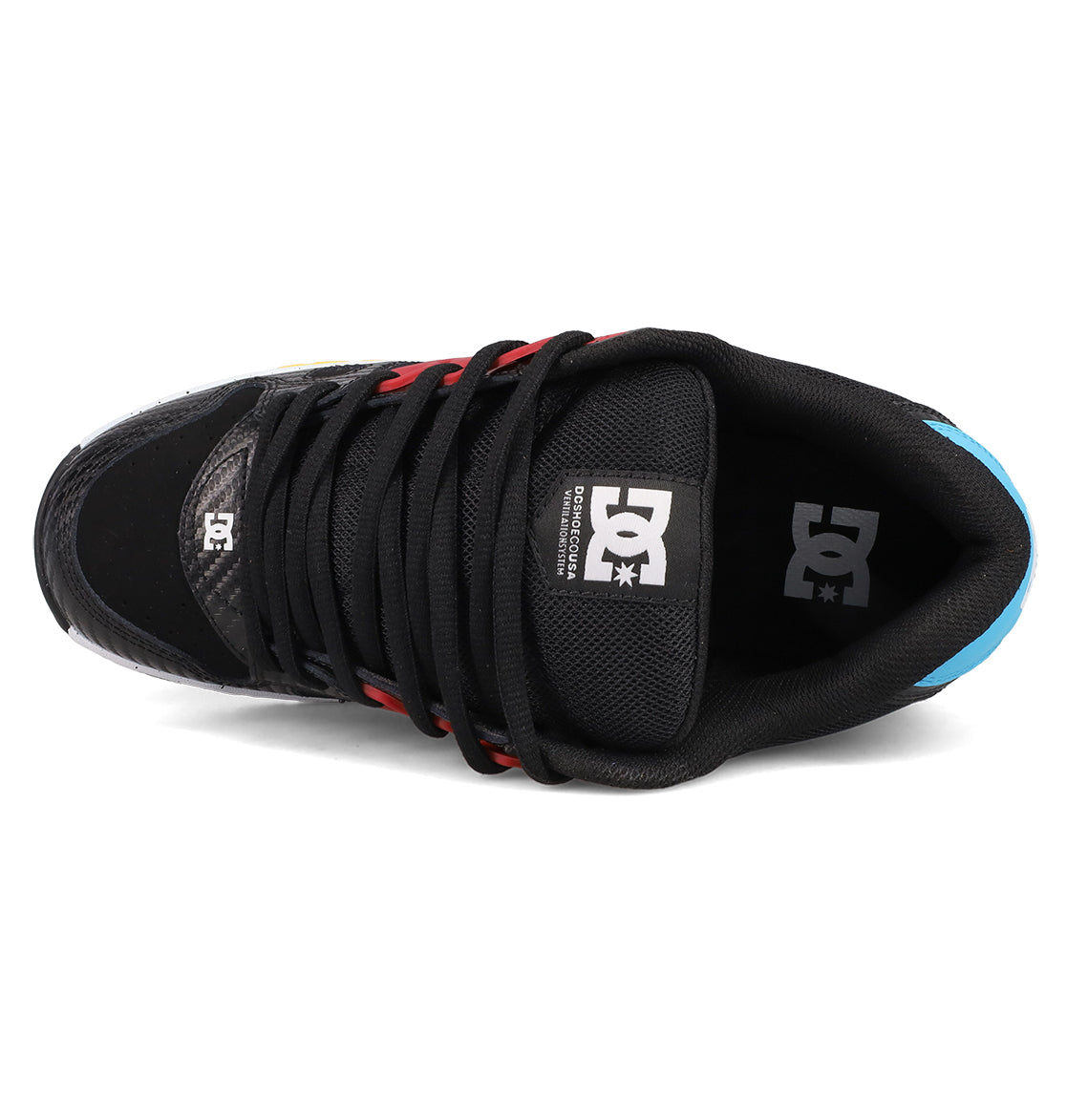 Top view of DC Shoes Men's AT-2: a black skate shoe with black laces, red and yellow accents, blue heel, and DC logo on tongue and insole. AEROTECH ventilation delivers breathable comfort for every ride.