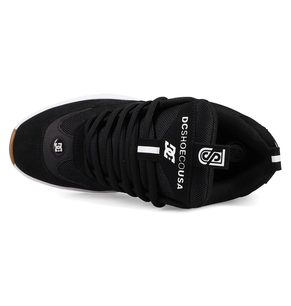 Top view of the Men's JS-2 Shanahan Pro Skate Shoes by DC Shoes in black, featuring black laces, white DC Shoes USA tongue branding, a white DC logo near the toe, and a white sole with a brown toe tip.