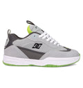 The Men's JS 2 Shoes by DC Shoes feature a gray and black colorway with white laces, a white midsole, neon green details, and a textured green outsole—iconic John Shanahan collection style shown in side profile.