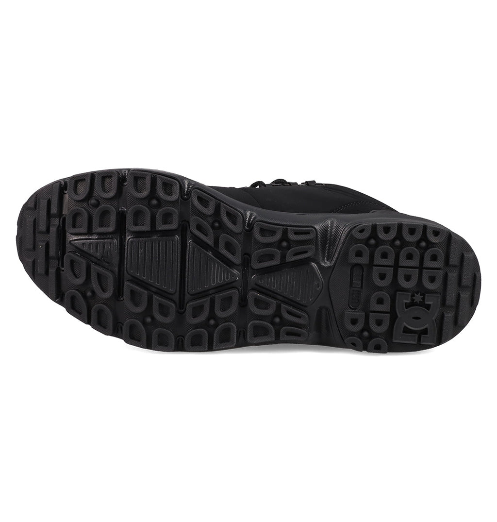 The Men's DC Tarmont Shoes by DC Shoes feature a black sole with a textured geometric tread for superior grip and durability. The embossed DC Shoes logo near the heel adds style, while the sturdy design ensures all-weather traction.