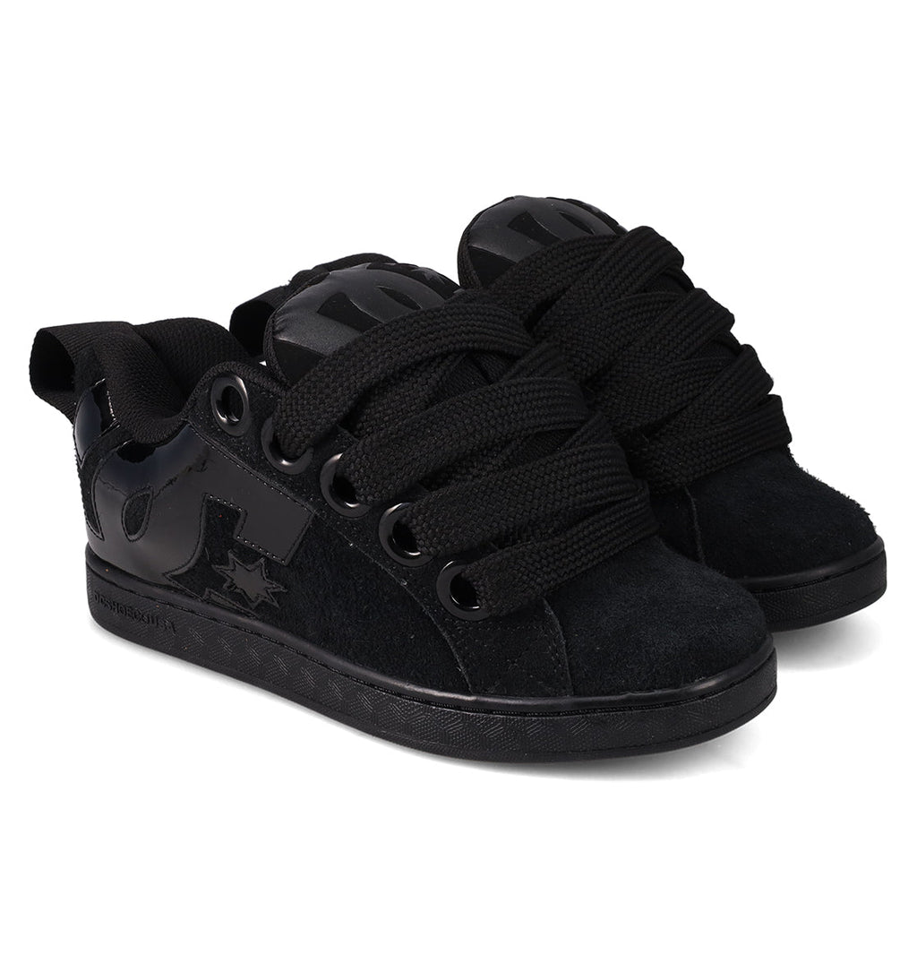 The Women's Court Graffik Puff Shoes by DC Shoes are black fashion sneakers with thick laces, black soles, and glossy side accents. Their puffy silhouette makes them bold statement shoes, shown here against a white background.