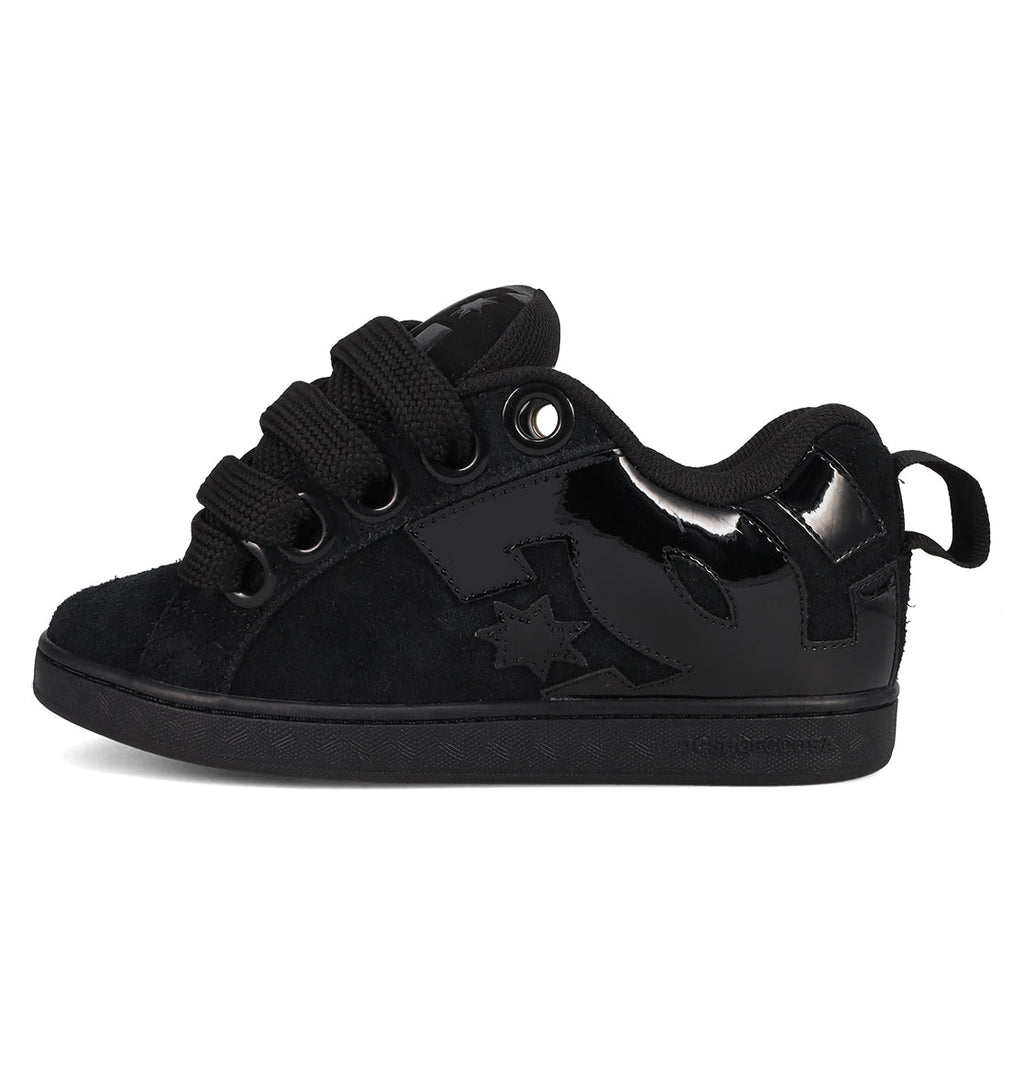 The Women's Court Graffik Puff Shoes by DC Shoes are black skate sneakers with a puffy silhouette, thick laces, suede and patent panels, plus a star and logo design on the side, shown on a white background.