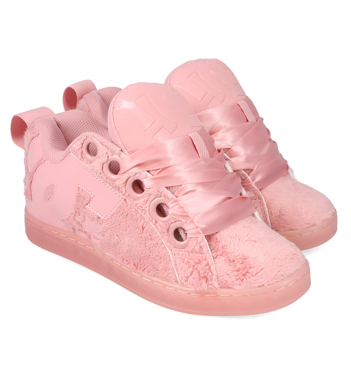 The Women’s Court Graffik Puff Shoes by DC Shoes feature a playful and stylish puffy silhouette inspired by the original Court Graffik Puff design. These pink fuzzy fashion sneakers are adorned with satin ribbon laces, thick soles, and heart-shaped tongue details, along with extra eyelets and back pull tabs for added flair.