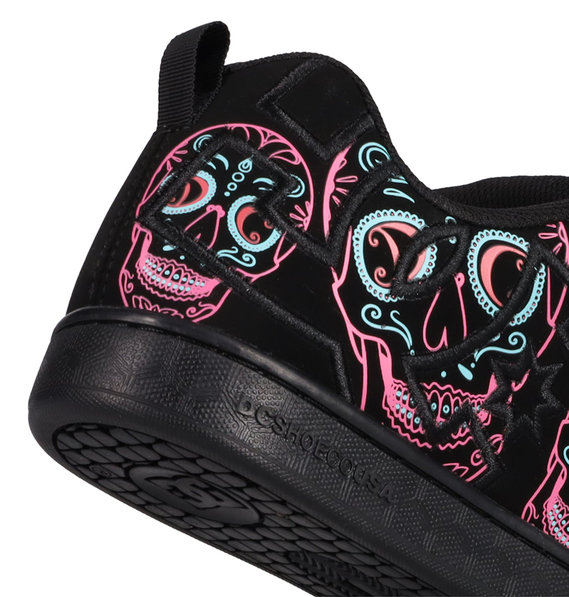 Step out in style with the Women’s Court Graffik Day Of The Dead by DC Shoes, featuring bold neon pink, blue, and white sugar skull artwork inspired by Día de los Muertos on a sleek black upper. Part of the Day of the Dead Collection, this sneaker boasts a textured sole for grip and a convenient black pull tab at the heel, blending DC Shoes comfort with festive flair.