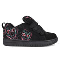 The DC Shoes Kids’ Court Graffik Day Of The Dead is a low-top black skate shoe with black laces, highlighted by vibrant neon skull designs inspired by Día de los Muertos on the sides and back. It features a black sole and DC Shoes branding on the side and tongue.