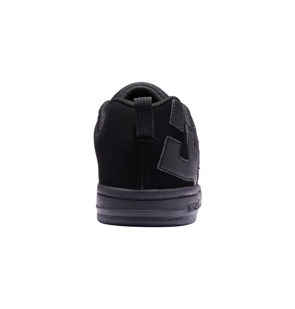 A black Kids’ Court Graffik Shoe by DC Shoes is shown from the back, highlighting the heel and sole details, a pull tab at the top, and textured side material. With its puffy silhouette inspired by the classic Court Graffik design, this kids’ sneaker stands out against a plain white background.