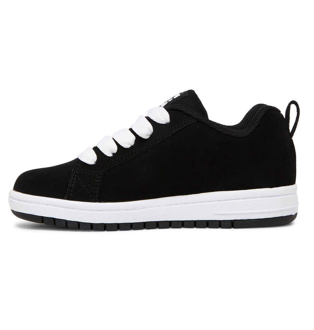 Black DC Shoes Kids’ Court Graffik skate-style shoe with a puffy silhouette, white sole, and white laces, displayed in a side view against a white background—a classic design inspired by the Court Graffik collection.