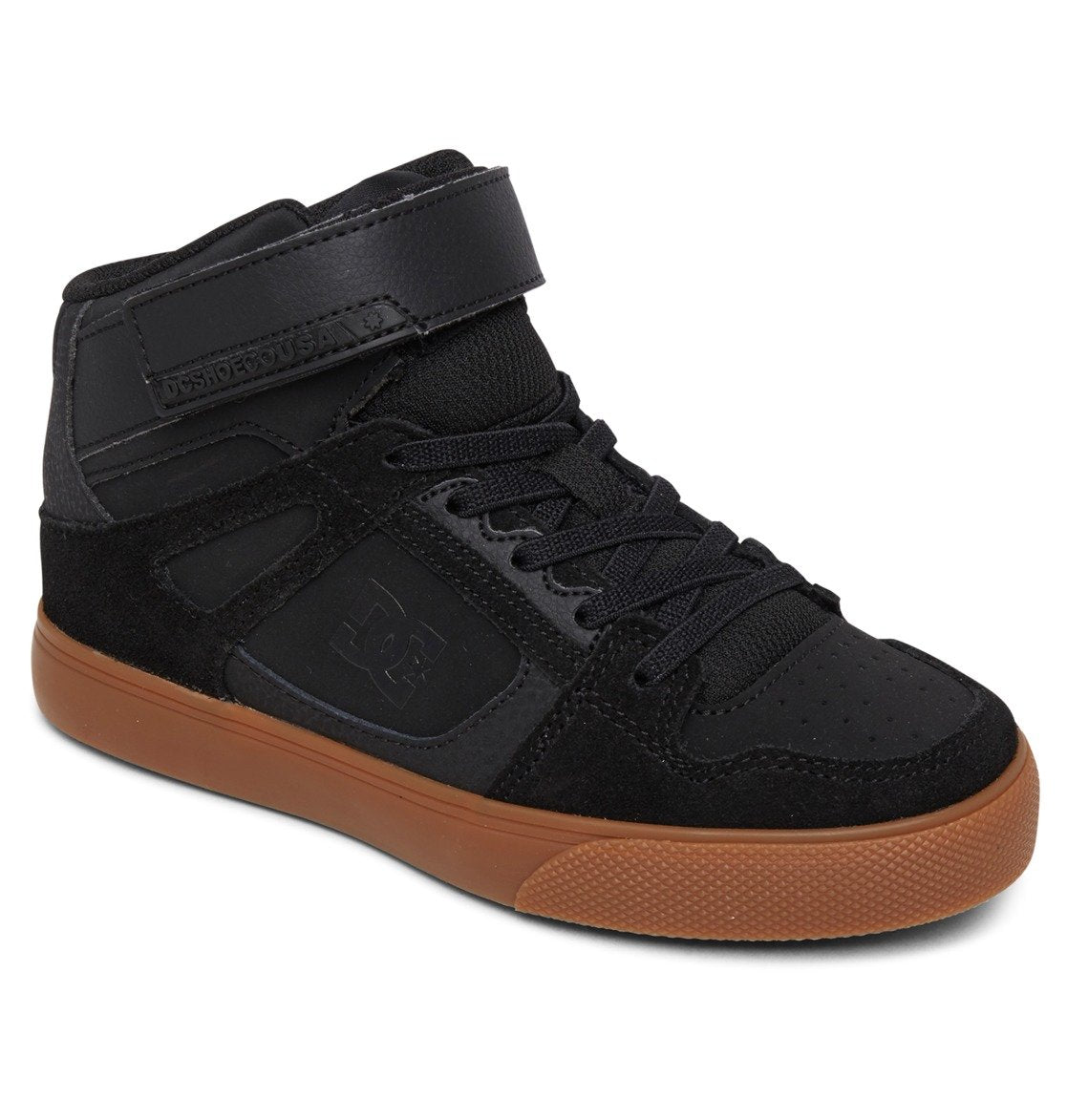 Introducing the Kids’ Pure High Elastic Lace High-Top Shoes from DC Shoes—a black high-top sneaker featuring black elastic laces, an ankle strap with Velcro closure, and a durable brown rubber sole. Designed with a perforated toe area, visible stitching, and a subtle embossed DC logo on the side, these shoes are perfect for stylish kids who love skate-inspired footwear.