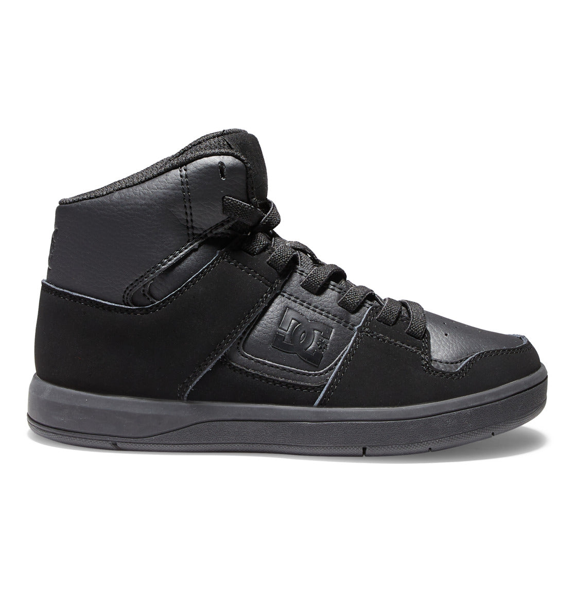 The DC Shoes Kids’ Cure High-Top Shoes feature an all-black design with matching black laces, a textured sole, and subtle logo accents on both the side and tongue. Photographed from the side against a white background, these affordable sneakers are a stylish choice for kids.