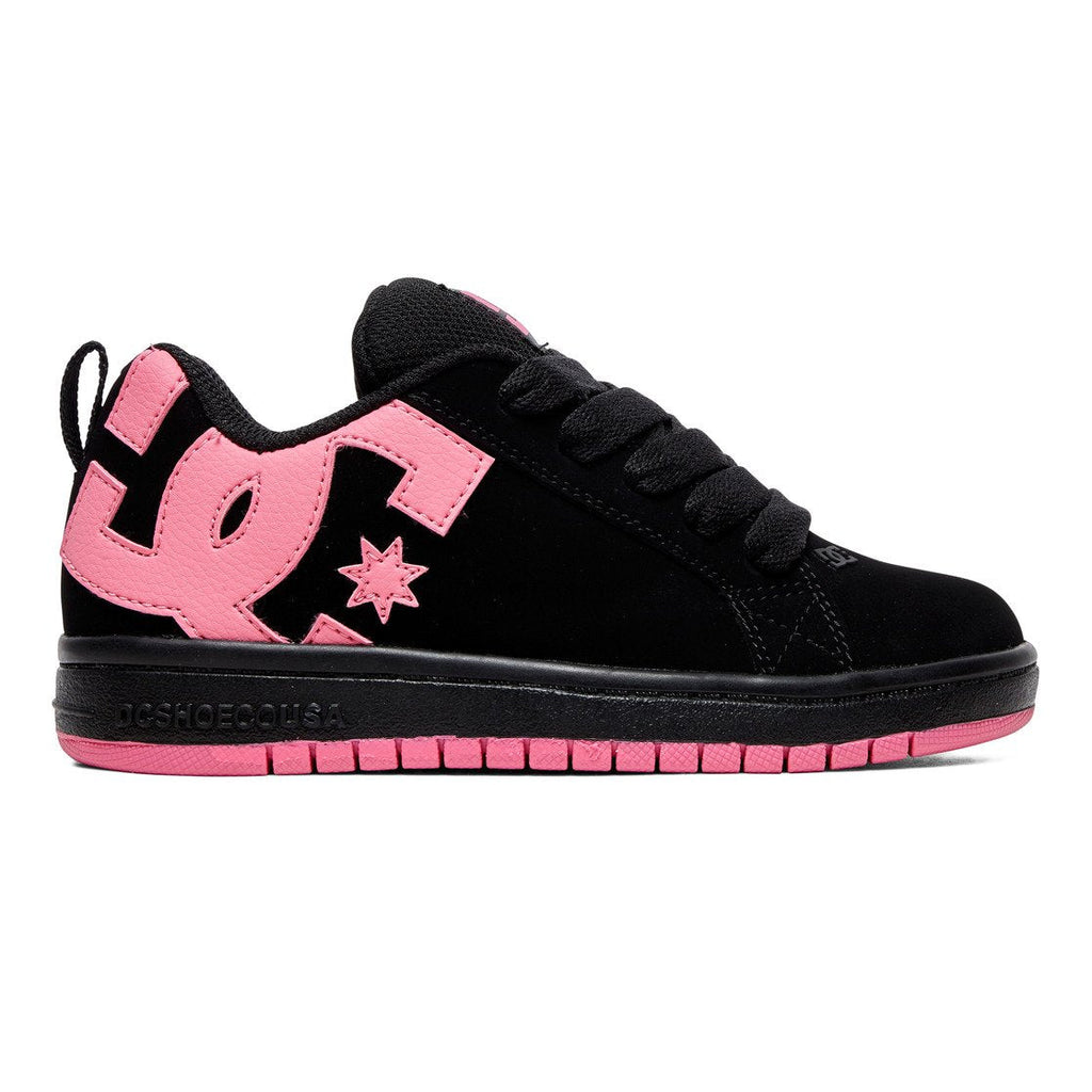 The Kids’ Court Graffik Shoes by DC Shoes feature a bold black design with a large pink DC Shoes logo and star on the side, pink accents on the sole, and black laces—making them a standout addition to any children’s footwear collection with their skate-inspired style.