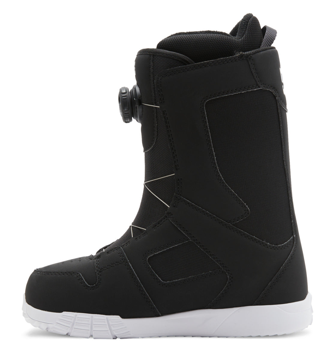 A side view of the DC Shoes Women’s Phase BOA® Snowboard Boot in black with a white sole, showcasing the BOA Fit System dial closure on the side and geometric stitching details.