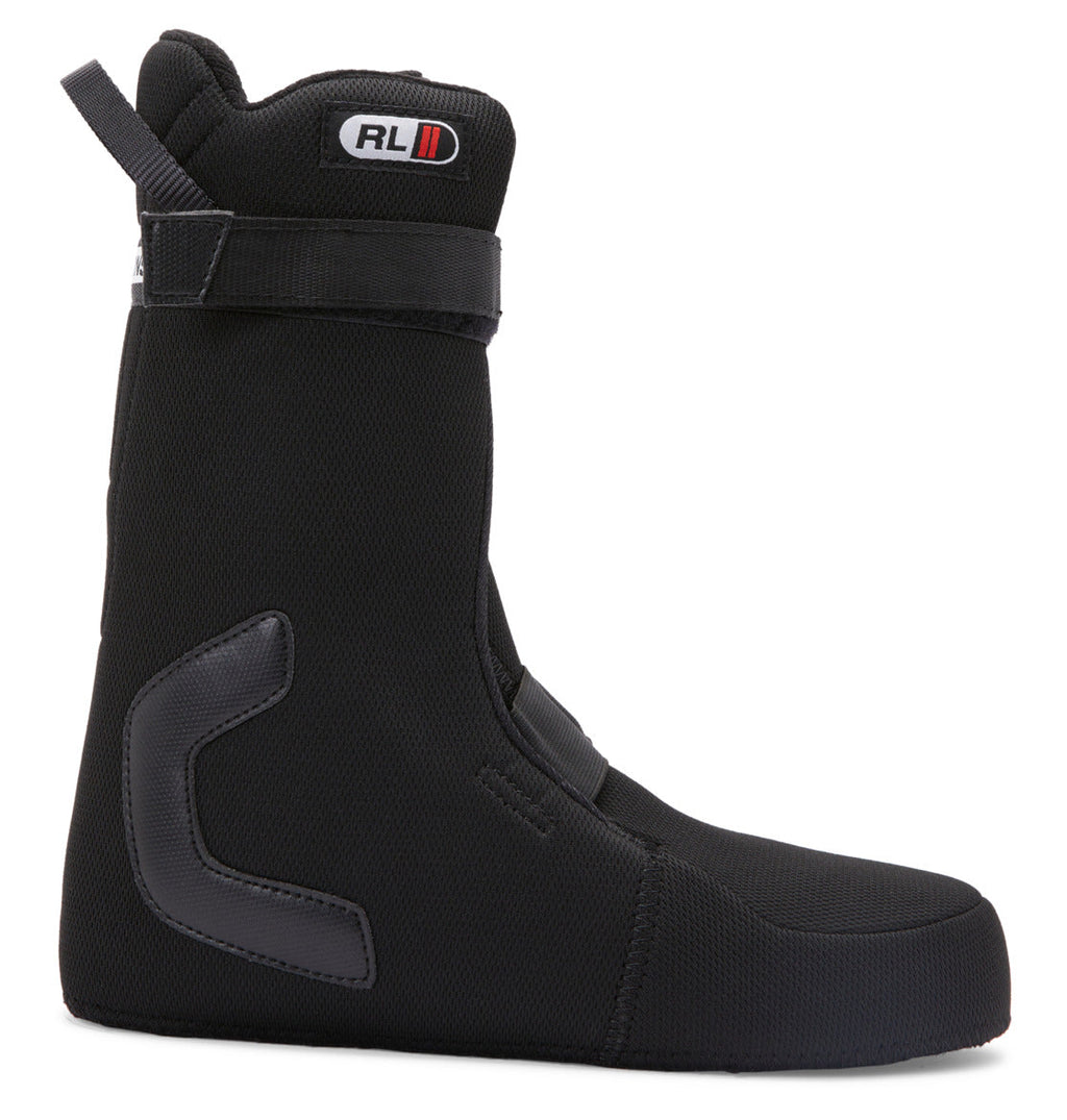 A side profile view of the Women’s Lotus BOA® Snowboard Boots by DC Shoes, featuring a black, padded R2 liner with a Velcro strap at the top and reinforced areas on the side and heel.