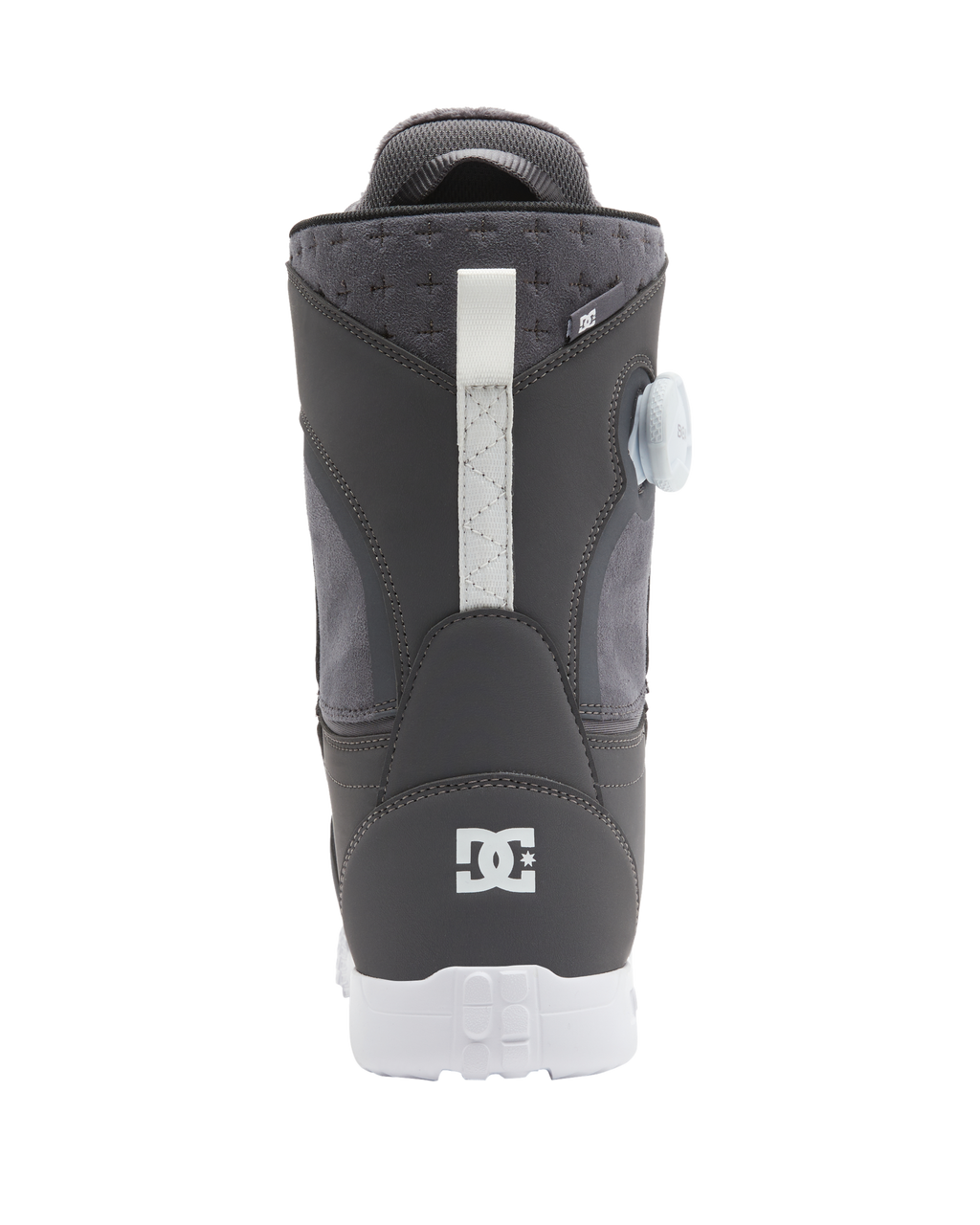 A rear view of the DC Shoes Lotus snowboard boot in gray and black with a white pull tab, circular side dial, and DC logo on the heel, pictured against a white background.