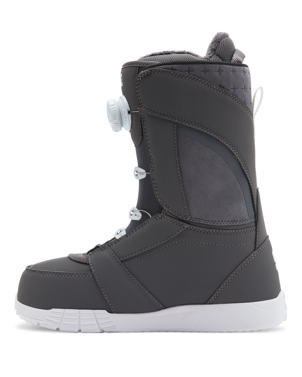 The DC Shoes Lotus snowboard boot, shown in profile facing left, features a dark gray design with a white sole and a dial lacing system against a plain white background.