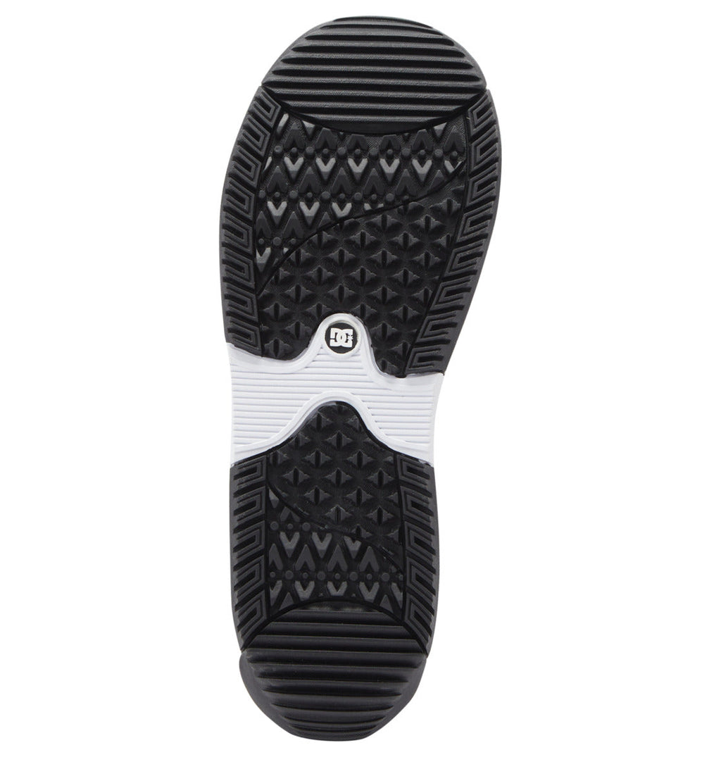 The image displays the black and white rubber sole of the DC Shoes Women’s Phase Pro Step On BOA® Snowboard Boot, which features textured geometric patterns and a small circular logo near the center.