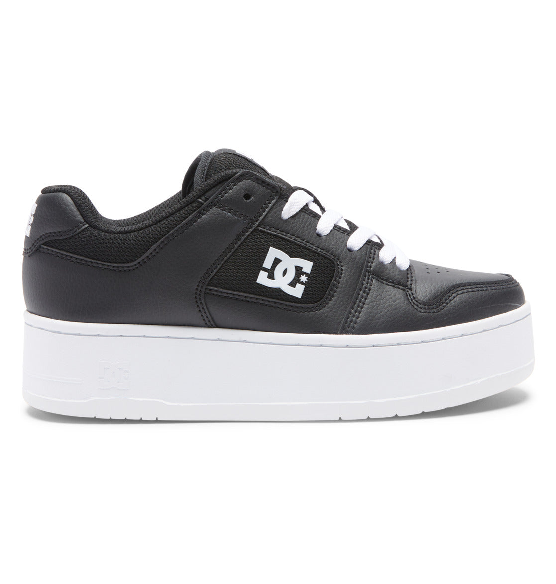 DC Shoes Women’s Manteca 4 Platform Shoes in black leather, showcasing a low-top silhouette with white laces, the classic white DC Shoes logo on the side, and a chunky white platform sole, presented in profile view.