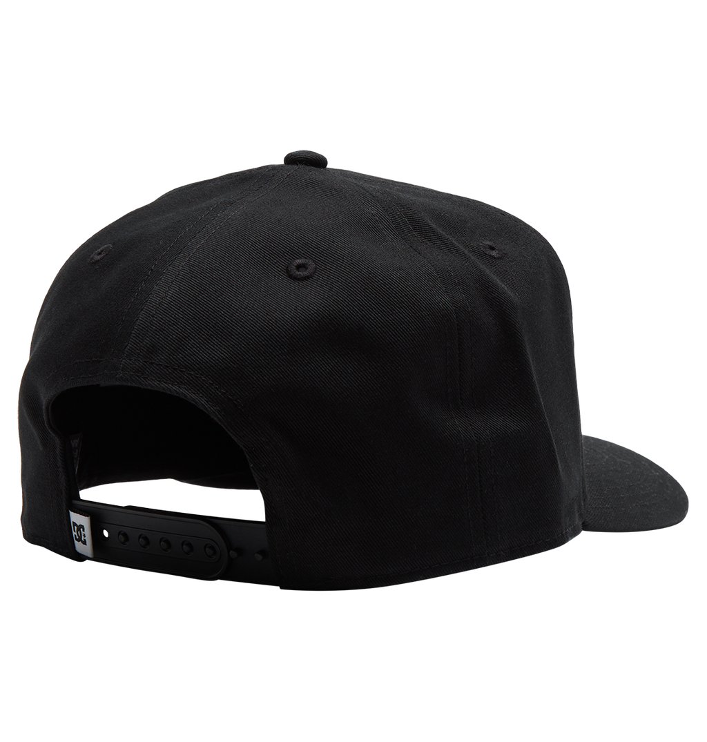 The Men's Reynotts Cap by DC Shoes is a black skate snapback, shown from the back with an adjustable plastic strap, a small white tag near the opening, and subtle DC branding for authenticity.
