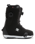 The Men’s Phase BOA® Pro Step On® Snowboard Boots by DC Shoes are black with a white sole, featuring the DC Shoes logo on the side. These boots include a Dual Zone BOA Fit System for easy tightening and a SUPERLOCK heel harness for enhanced support, shown against a white background.