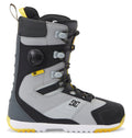 Introducing the Men’s Premier Hybrid BOA® Snowboard Boots by DC Shoes—crafted in a stylish combination of gray, black, and yellow. These boots showcase the advanced BOA® Fit System with a sleek black dial and gray laces, complemented by a rugged sole for exceptional durability. The DC Shoes logo appears on the side near the heel, underscoring their high-performance Premier Hybrid design.