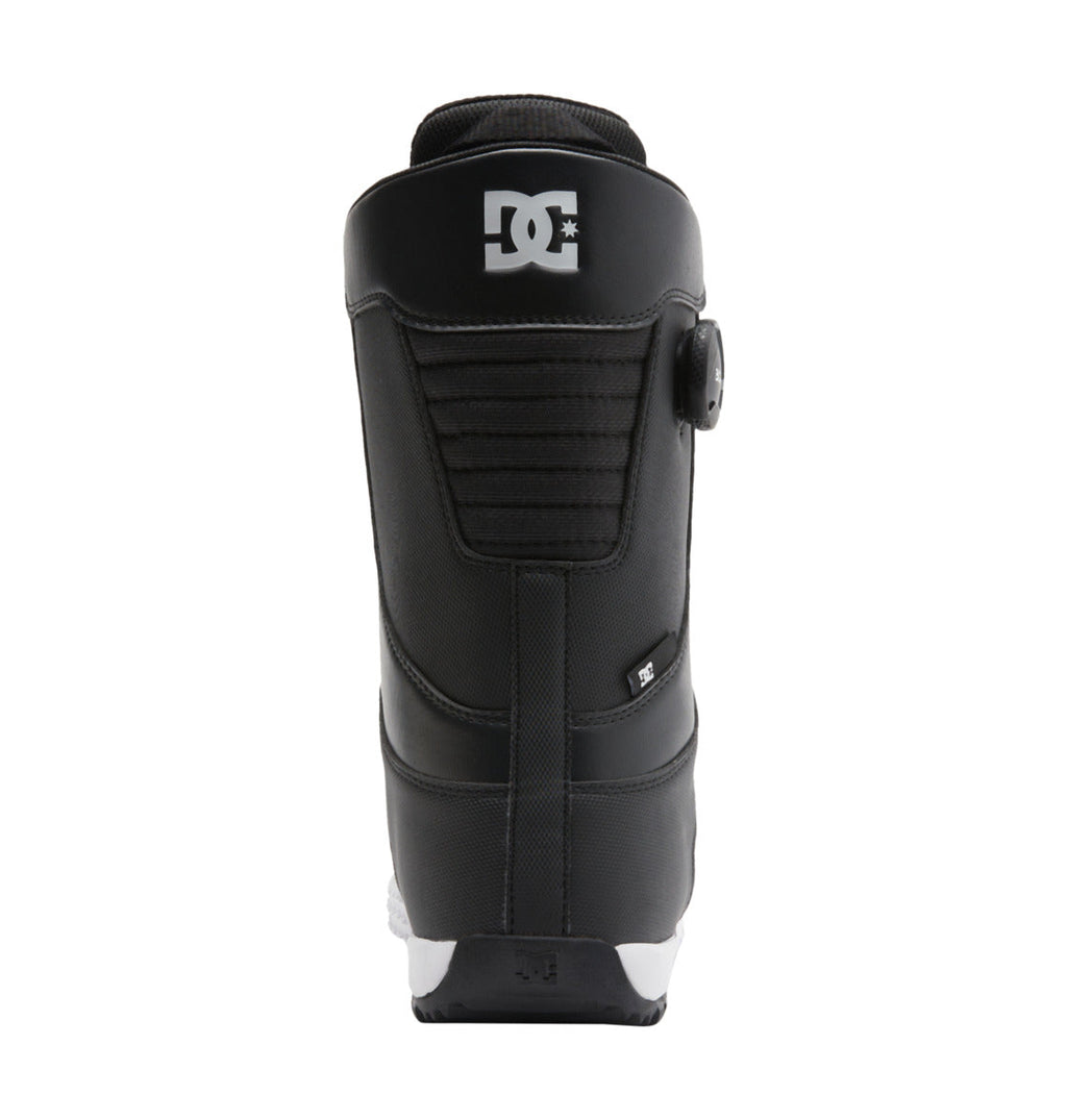 Rear view of a black DC Shoes Men’s Control BOA® Snowboard Boot featuring a Dual Zone BOA® Fit System dial on the right side, padded stitching, and the signature white DC Shoes logo at the top.