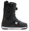 The Men’s Control BOA® Snowboard Boots by DC Shoes are shown in profile against a white background, featuring a black upper with a white sole, side BOA dial, reinforced stitching, and the DC logo on the side. These all-mountain boots utilize the Dual Zone BOA Fit System for precise adjustment and blend advanced snowboarding performance with signature DC skate style.