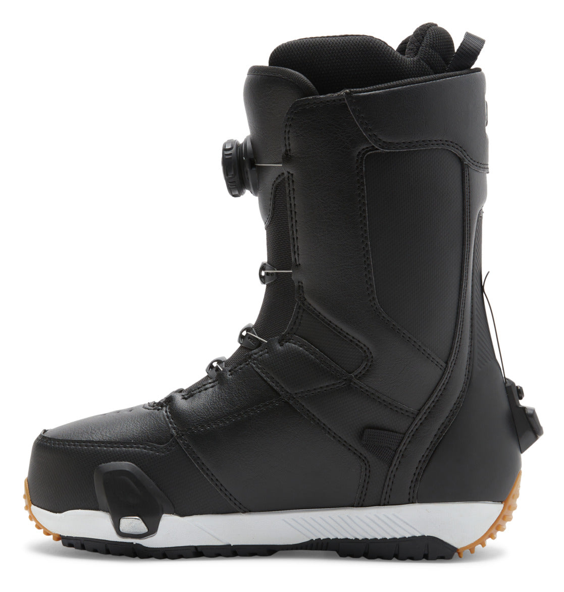 The DC Shoes Men’s Control Step On BOA® Snowboard Boots, shown in black with a textured sole, ankle support, and the Dual Zone BOA Fit System dial lacing system, are displayed from the side on a white background—highlighting true snow boot innovation.
