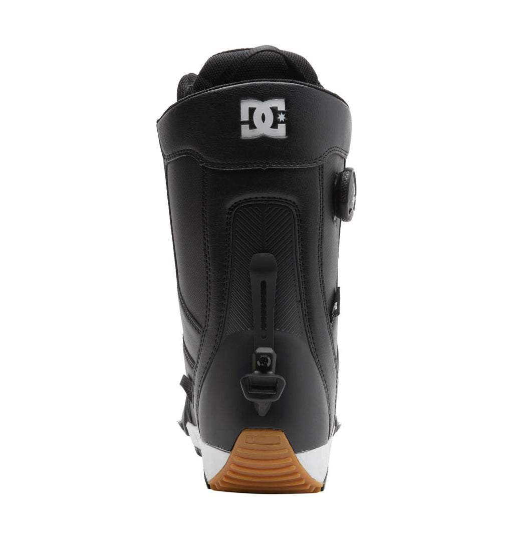 A men’s DC Shoes Control Step On BOA® snowboard boot in black, viewed from the back to showcase the DC logo, rear adjustment mechanism, and brown rubber sole—demonstrating innovative snow boot design.