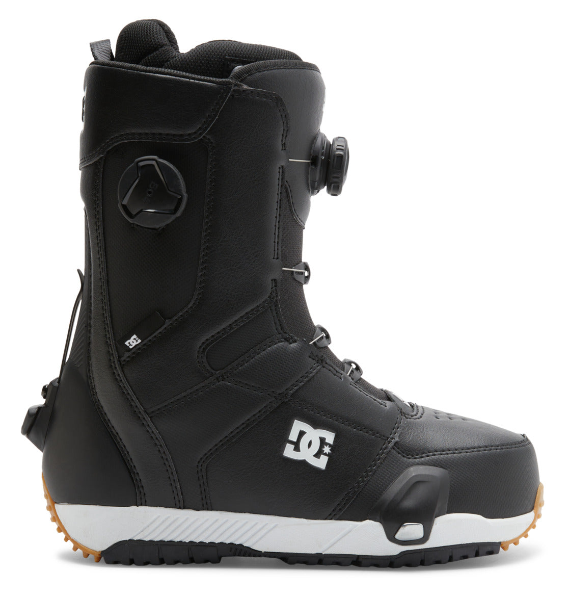 A black Men’s Control Step On BOA® Snowboard Boot by DC Shoes, featuring a white logo, rugged rubber sole, and Dual Zone BOA® Fit System for precise adjustment, shown in profile on a white background.