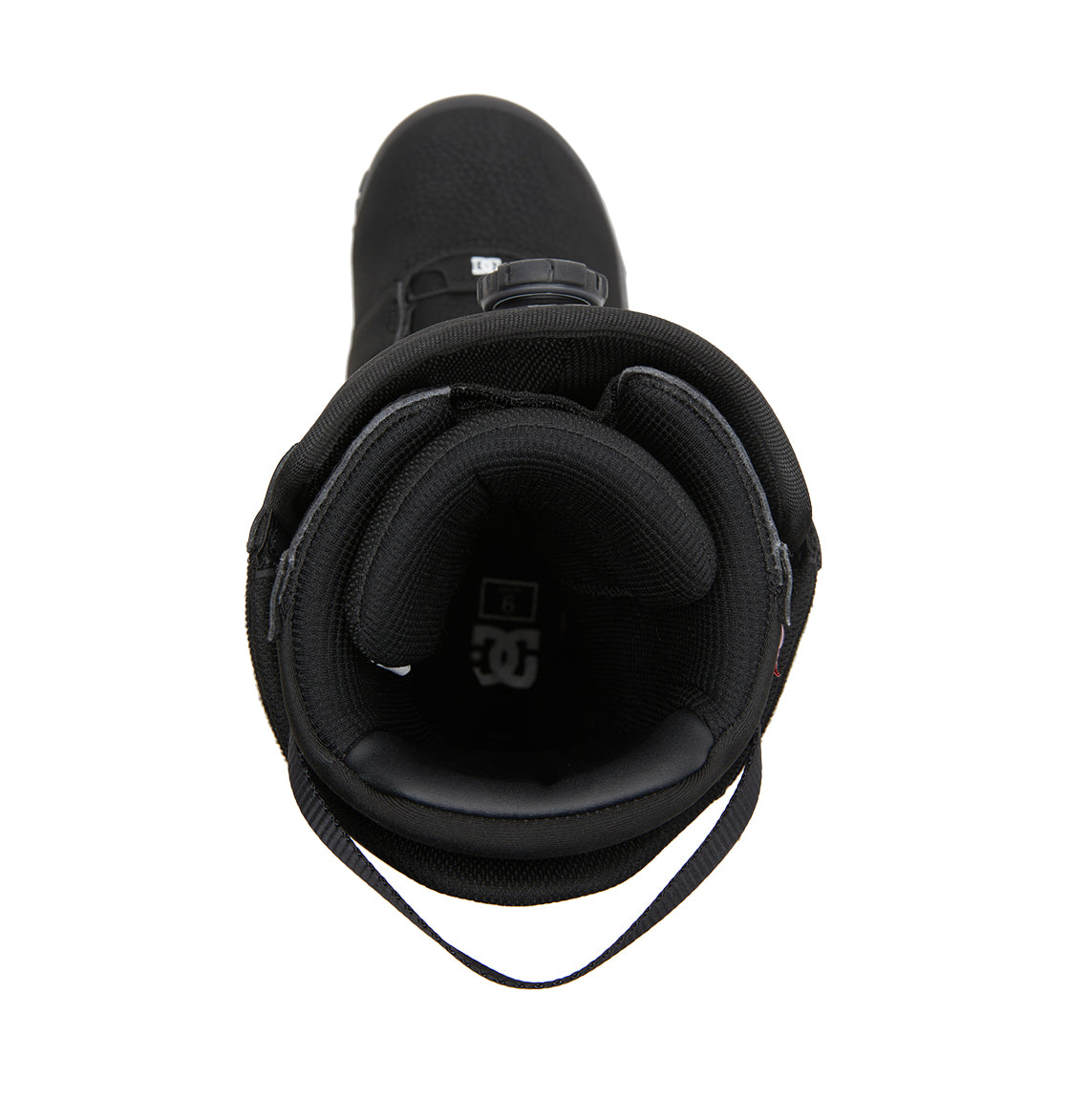 Top view of a black Men’s Judge BOA® Snowboard Boot by DC Shoes, showcasing padded lining, a pull tab at the back, and the visible DC logo inside the heel area. Engineered for performance with a sleek profile, this snowboard boot is photographed against a white background.