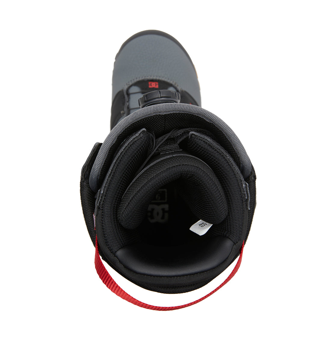 Top view of the DC Shoes Men’s Judge BOA® Snowboard Boots in black and gray, showcasing a red pull loop at the heel. The padded interior and tongue with a visible white tag are prominent, while the Dual Zone BOA® Fit System provides a secure and customizable fit.