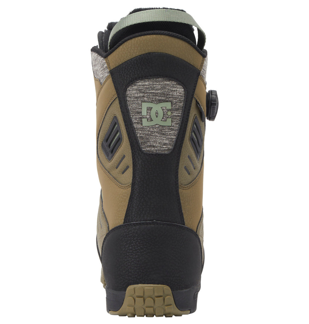 A rear view of the DC Shoes Men’s Judge BOA® Snowboard Boots in brown and black, showcasing a gray DC Shoes logo, rugged Vibram outsole, textured fabric construction, top pull loop, and an advanced Dual Zone BOA® Fit System for precise adjustment.