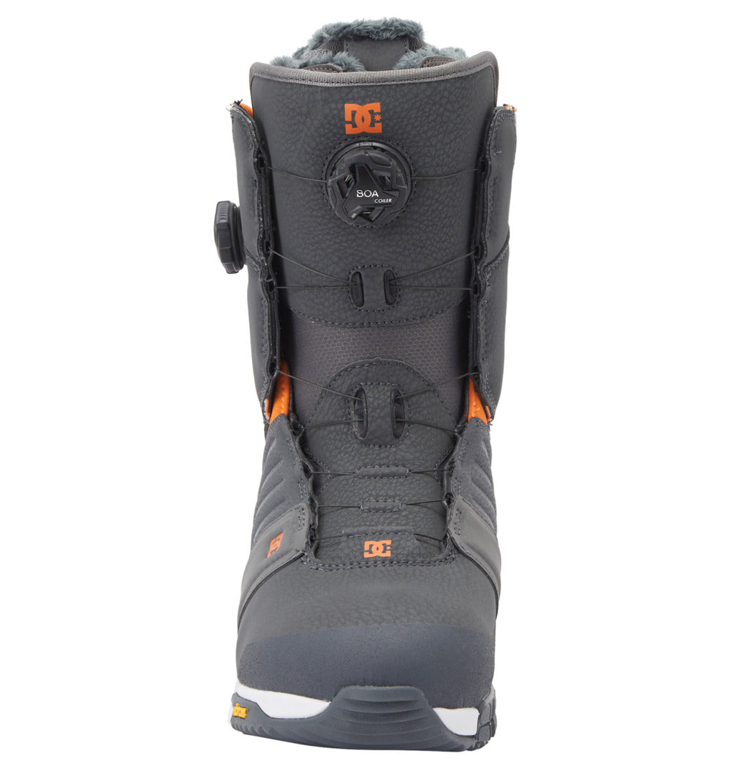 A single Men’s Judge BOA® Snowboard Boot by DC Shoes in gray with orange accents, displayed from the front. The boot highlights a centrally placed Dual Zone BOA® Fit System dial and textured detailing around the ankle and toe, finished with a rugged Vibram outsole for durability.