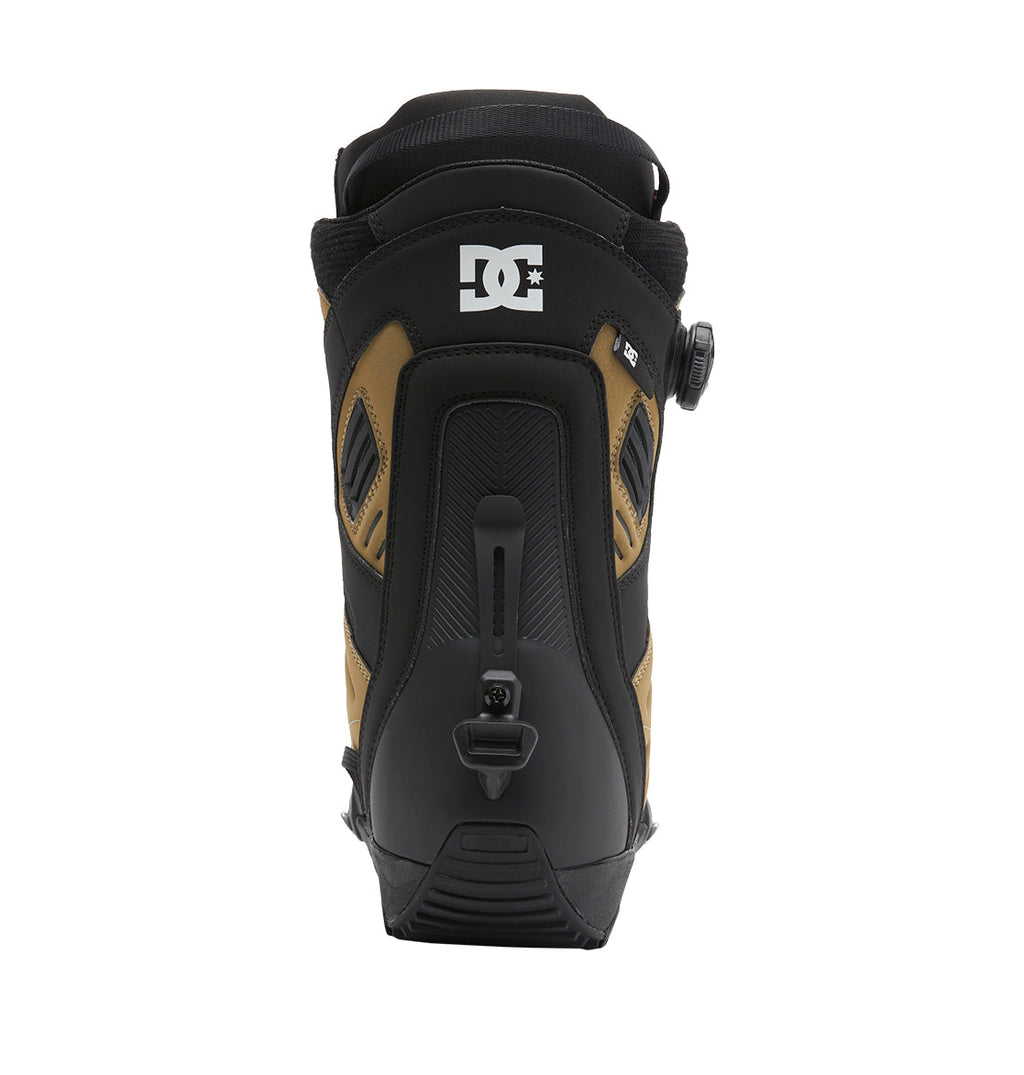 Rear view of the DC Shoes Men’s Judge Step On® Snowboard Boot in black and brown, displaying the white DC logo at the collar, BOA Fit System dial adjustment on the side, and a heel pull loop.